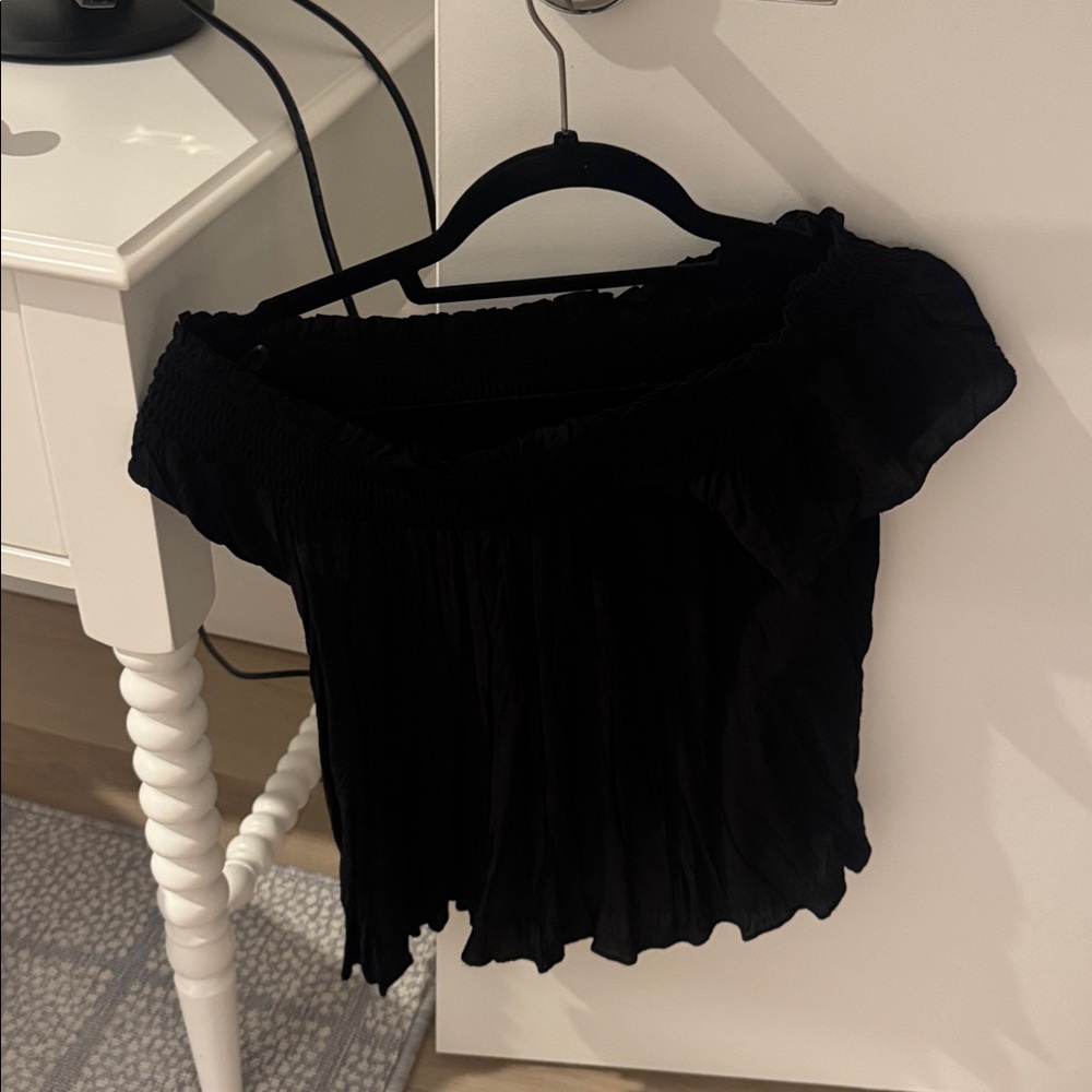 Talula Black Ruffled off the shoulder top. Brand new never worn with tags!!!